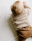 Alt Image Text: Chase Oversized Baby Pullover in Chai – 100% Organic Cotton, Cozy & Warm, Perfect for Fall & Winter, Stylish and Comfortable Baby Sweater, Ideal Gift for Newborns and Toddlers